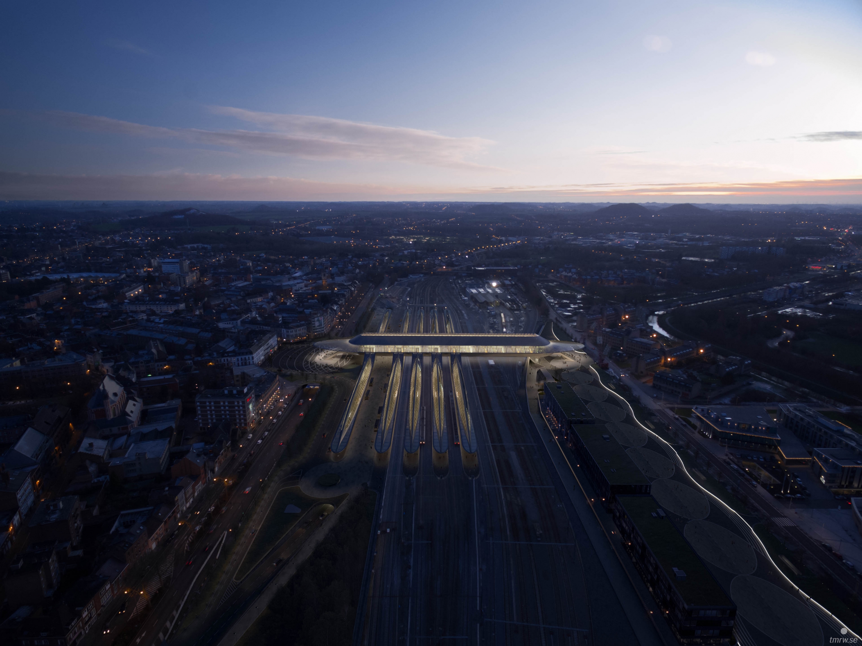 Architectural visualization of Gare de Mons​​​​​​​ for Santiago Calatrava, arial of train station and a city in dusk