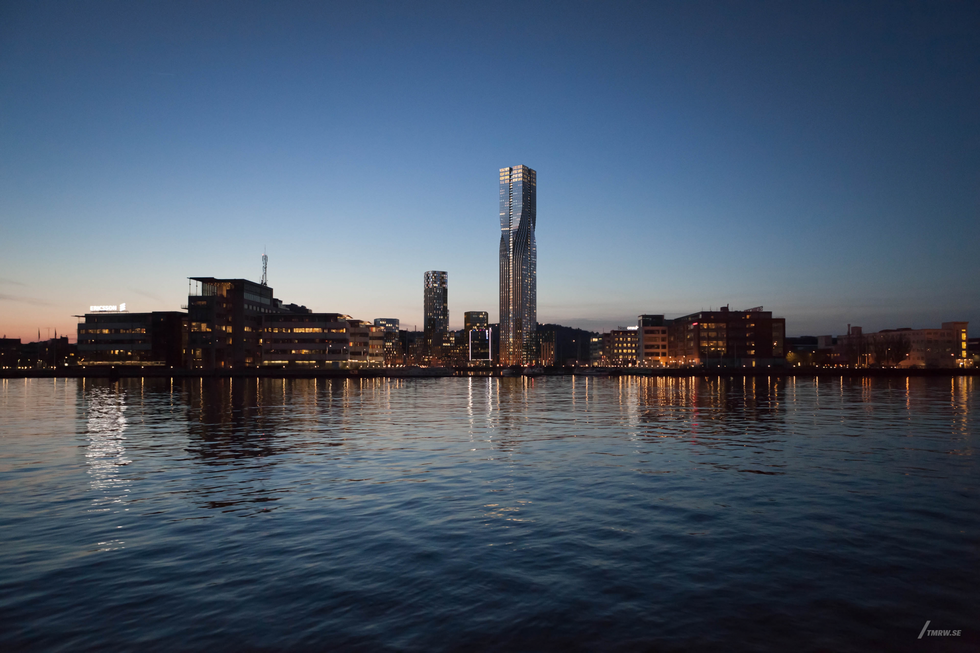 Architectural visualization of Karlatornet for Serneke a skyscraper in evening light from a sea view.