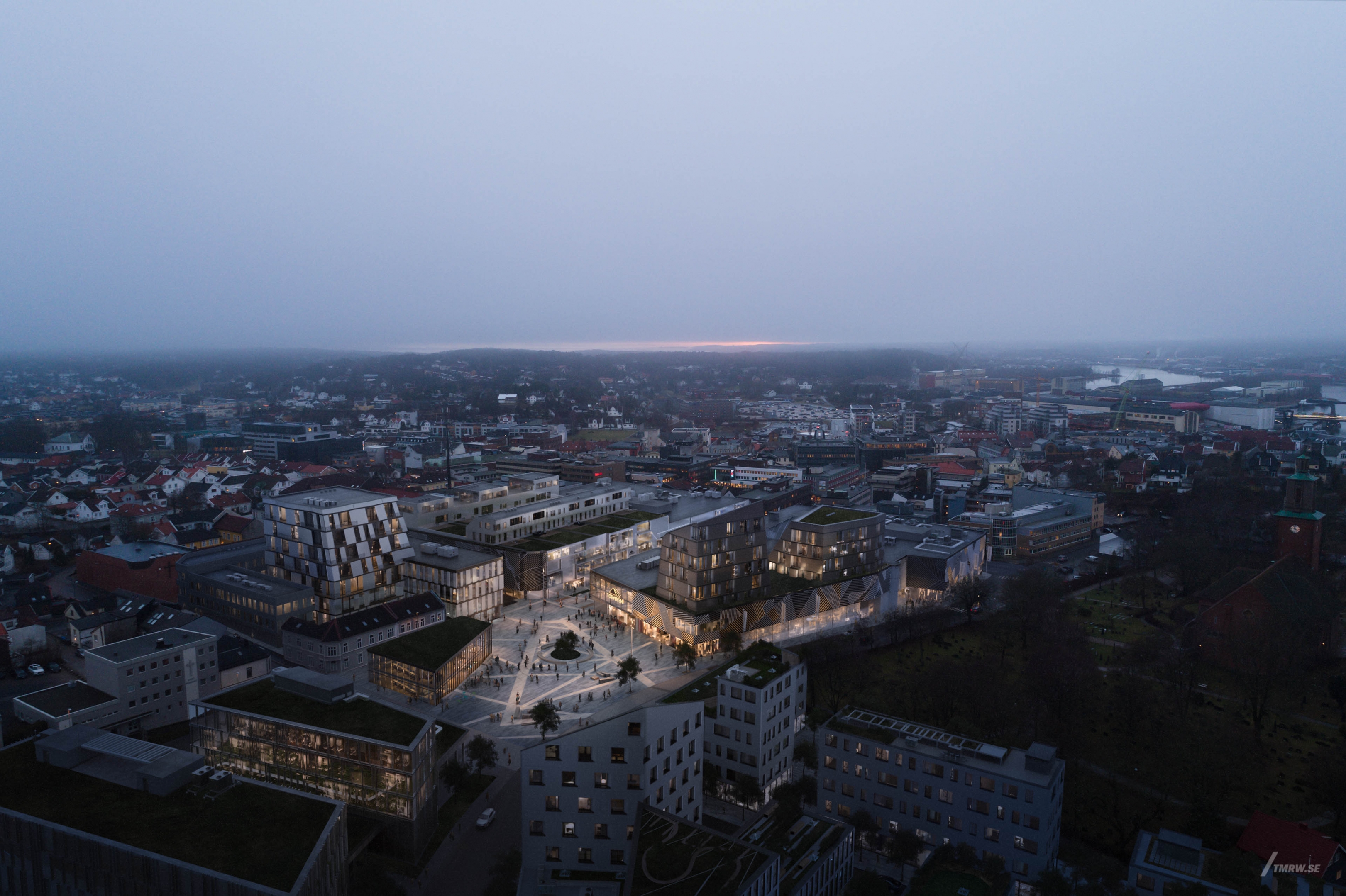 Architectural visualization of Torvbyen for Snöhetta, a masterplan area in dusk light from an aerial level view.