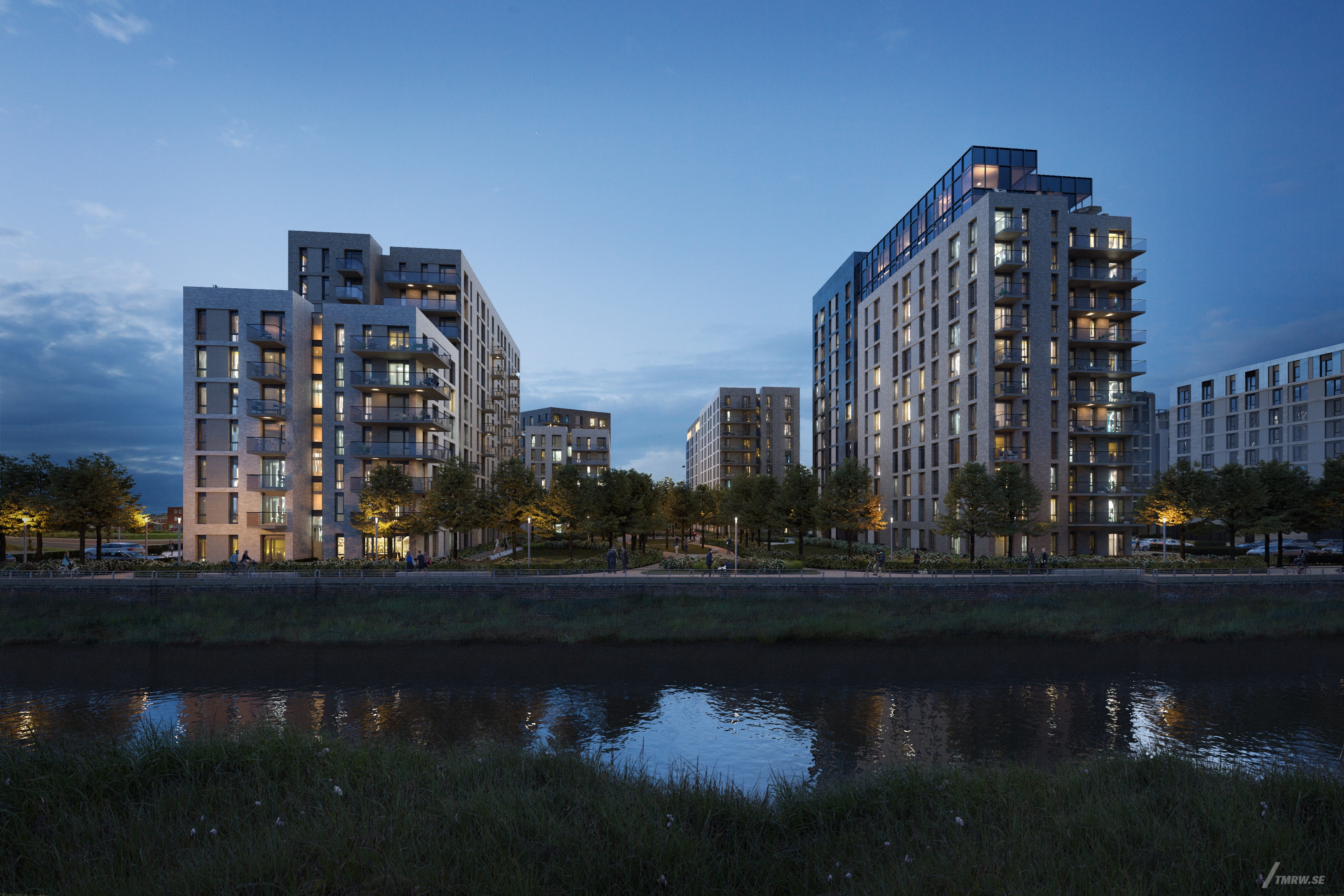 Architectural visualization of Leeds for CallisonRTKL. A view in front of the canal with the buildings behind. This is in the night light.
